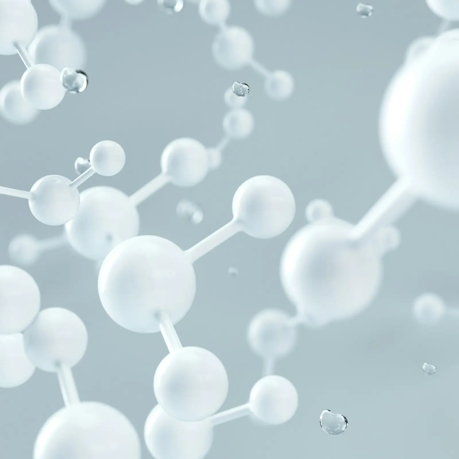 White molecular structure on a pale background